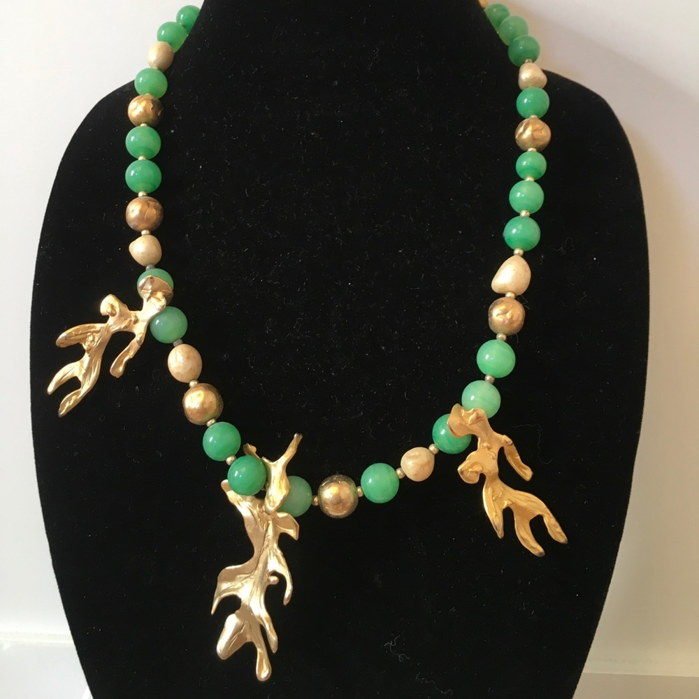 Handmade necklace. Green and white stones, gold balls, seaweed designs